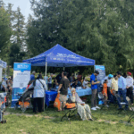Families and neighbors celebrate at the 23rd Fleetwood Community Festival with food, music, games, and a movie night under the stars.