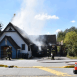 Firefighters fight an inferno tearing through the former Surrey Little Theatre building on 184 Street in Clayton Heights