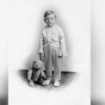 Eric Neville Dennison is shown in 1910 with his teddy bear