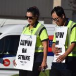 Surrey postal workers strike as new offer rejected