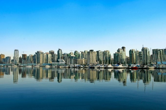 Vancouver skyline highlighting Canada’s immigration and education system vulnerabilities explored in Surrey Speak’s report on organized crime and extortion.