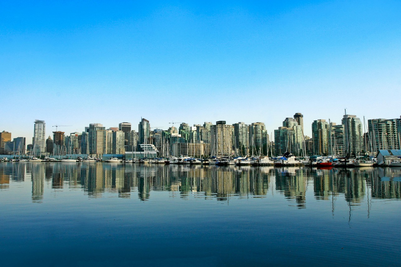 Vancouver skyline highlighting Canada’s immigration and education system vulnerabilities explored in Surrey Speak’s report on organized crime and extortion.