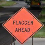 Surrey Speak – ‘Flagger Ahead’ road sign used to illustrate Surrey council’s approval of a $4.75M annual contract for traffic control and flagging services.