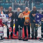 Mayor Brenda Locke joins Surrey Eagles Punjabi Night ceremonial puck drop with players and community leaders at South Surrey Arena.