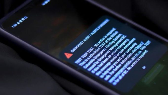 A BC Emergency Alert System test message displayed on a mobile phone during the province-wide alert scheduled for 1:55 p.m., shown as part of Surrey’s public safety coverage.