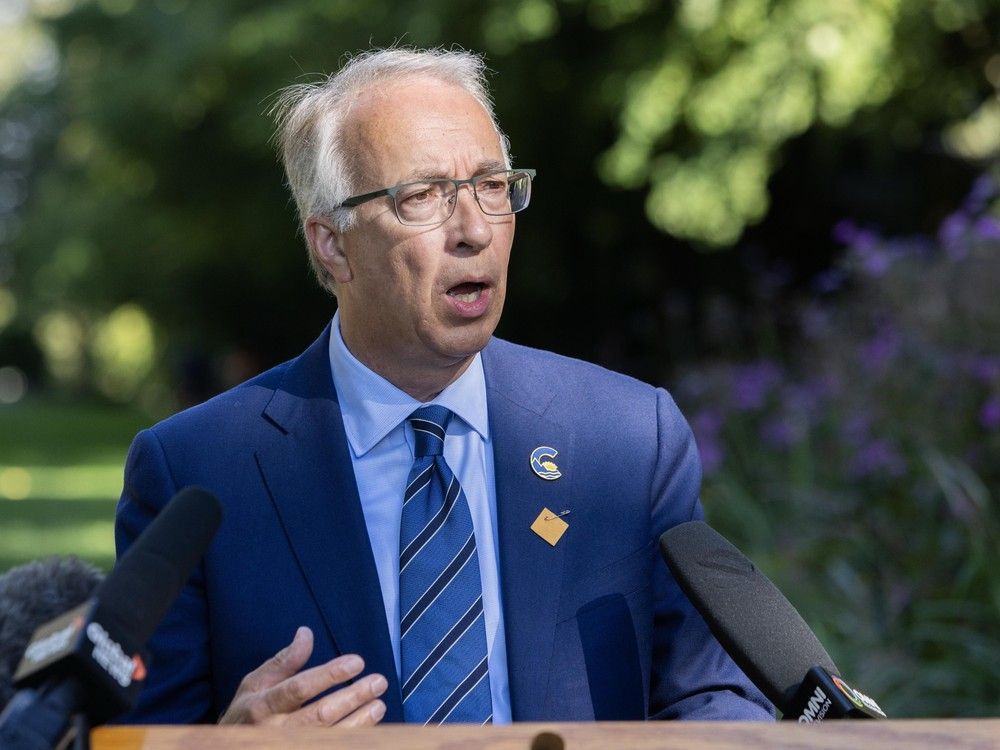 John Rustad speaks outdoors at a press conference as internal tensions rise within the B.C. Conservative Party.