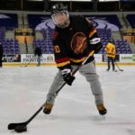 Blind hockey player practicing with an adapted steel rattling puck at Save-On-Foods Memorial Centre during a Canadian Blind Hockey Association session in B.C.