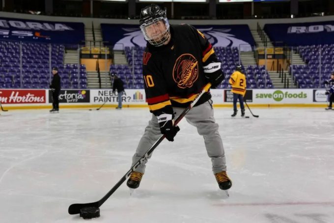 Blind hockey player practicing with an adapted steel rattling puck at Save-On-Foods Memorial Centre during a Canadian Blind Hockey Association session in B.C.
