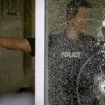 Police investigate shattered glass and bullet holes at Kap’s Cafe in Surrey after shots were fired during B.C.’s ongoing extortion attacks.