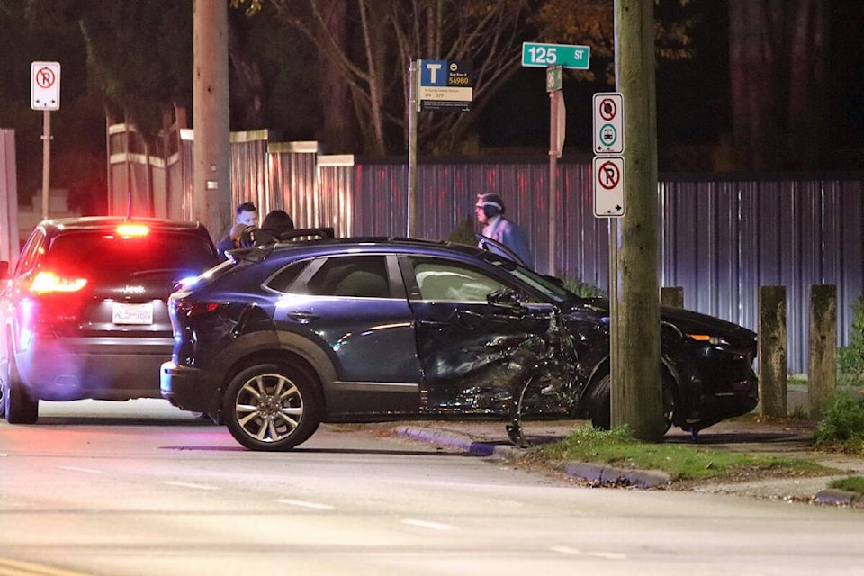 Damaged vehicle at 125 Street in Surrey after a collision involving an SPS cruiser responding to a shooting investigation.