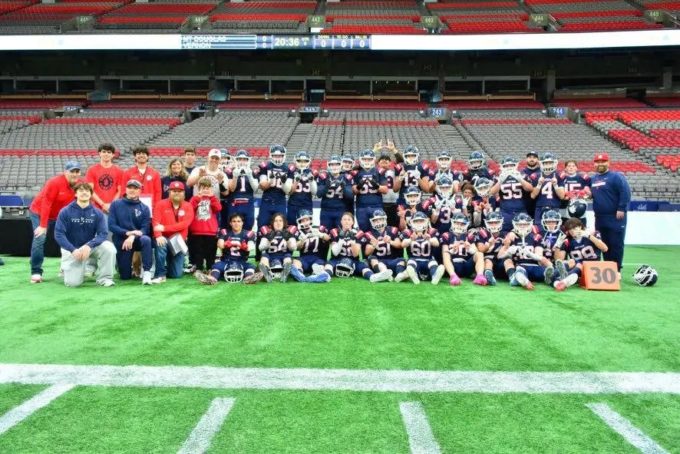 Vernon Panthers football team celebrates at BC Place after securing a spot in the B.C. Senior Varsity AA final.