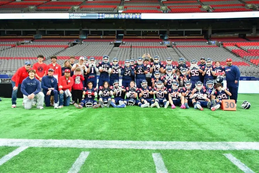 Vernon Panthers football team celebrates at BC Place after securing a spot in the B.C. Senior Varsity AA final.