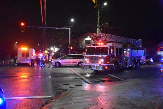 Emergency crews, fire truck, and ambulance at Surrey Fraser Heights intersection after a three-year-old child was struck by a minivan | Surrey Speak news coverage.