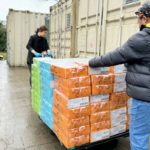 Volunteers move large stacks of boxed food at St. Joseph’s Food Bank in Mission during donation shortages, used by Surrey Speak for reporting on the $100,000 shortfall.