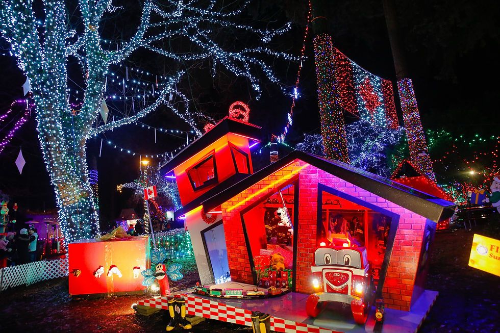 Festive Bright Nights light display at Noel Surrey, featuring colourful holiday decorations and illuminated structures at Cloverdale Fairgrounds.