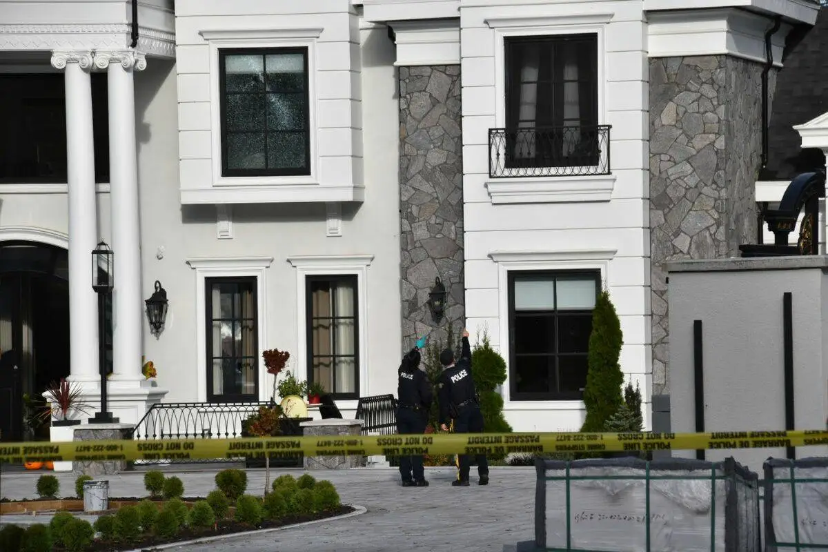 Gunshot damage is visible on a rural South Surrey home