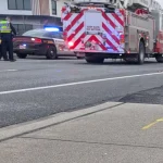 A van allegedly left the road and struck two pedestrians on a sidewalk on McCallum Road on Saturday