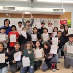 Division 3 students at Old Yale Road Elementary, in teacher David Lee’s Grade 6/7 class, and their seasonal class projects: encouragement letters the students wrote for anyone who has to spend the holidays alone