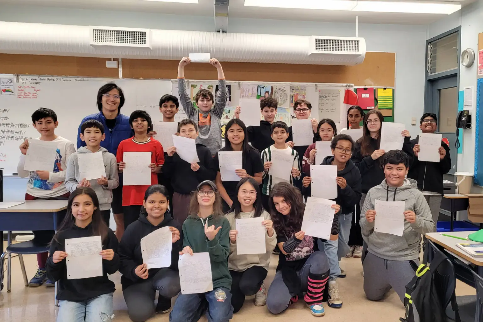 Division 3 students at Old Yale Road Elementary, in teacher David Lee’s Grade 6/7 class, and their seasonal class projects: encouragement letters the students wrote for anyone who has to spend the holidays alone