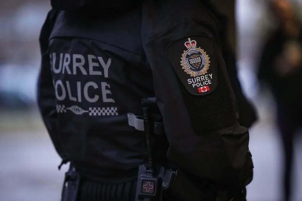 A Surrey police department logo