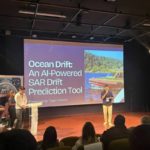 Students present their Ocean Drift AI-powered search-and-rescue drift prediction tool on stage at the global Ocean Hackathon finals in France.