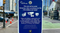 A blue City of Vancouver sign posted near the Stadium