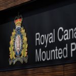 Royal Canadian Mounted Police sign on a detachment building, representing RCMP involvement in the Fort St. James murder investigation.