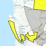 Environment Canada weather alert map highlighting strong-wind and snowfall warning zones across Interior B.C. and coastal inlets.