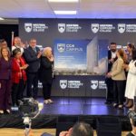 Leaders applaud at Western Community College CC4 campus unveiling.