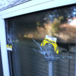 File photo of bullet damage from a recent extortion-related shooting in Surrey
