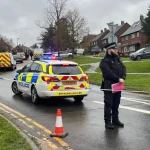 The man's body was found outside a house on Friday morning