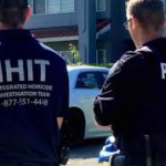 IHIT investigators and Surrey police officers standing near a residential crime scene in Surrey, B.C.