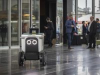 Screenshot of a City of Surrey social media post showing an autonomous food delivery robot demonstration at Surrey City Hall.