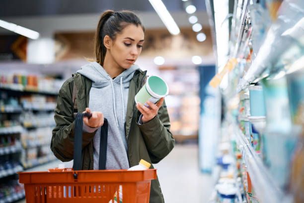 Surrey resident shopping for groceries, highlighting local household spending patterns and retail choices