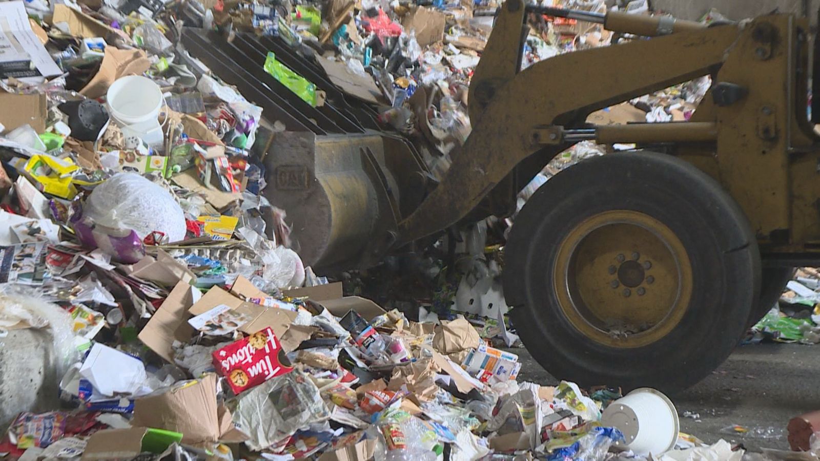 Heavy machinery moving garbage at the Vancouver Landfill in Delta, B.C.