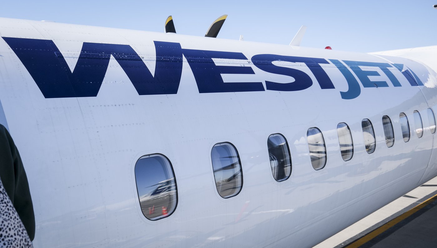 WestJet airplane at Vancouver International Airport after delay caused by unruly passengers