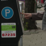 Modern Vancouver parking meter showing digital payment options without coin slot