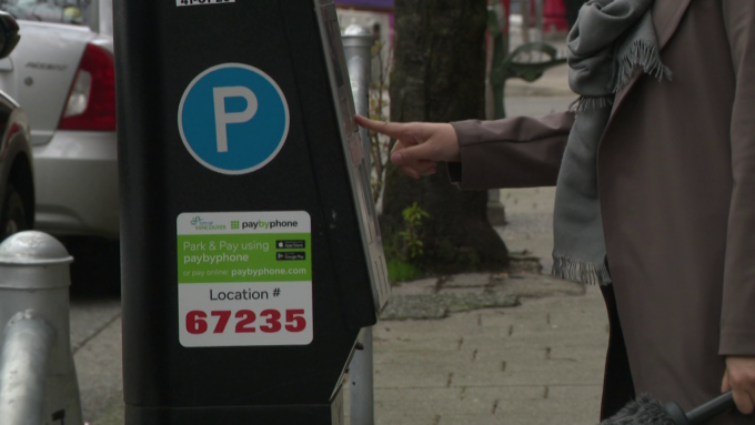 Modern Vancouver parking meter showing digital payment options without coin slot