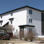 Residential infill housing development in Edmonton neighbourhood with modern multi-unit homes