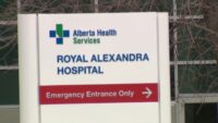 Royal Alexandra Hospital emergency entrance in Edmonton with security presence