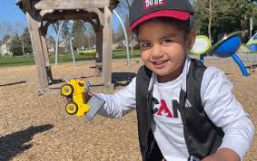 Parents with child suffering from rare neurodegenerative disorder seeking gene therapy treatment in British Columbia