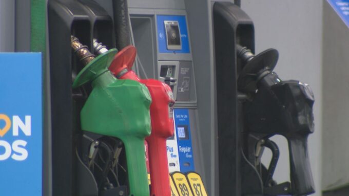 Commercial truck refueling diesel at gas station in British Columbia