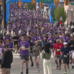 Thousands of runners participating in the Vancouver Sun Run 2026 through downtown Vancouver streets