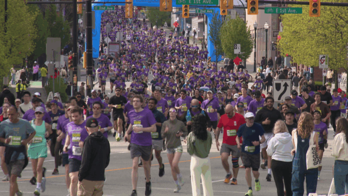 Thousands of runners participating in the Vancouver Sun Run 2026 through downtown Vancouver streets