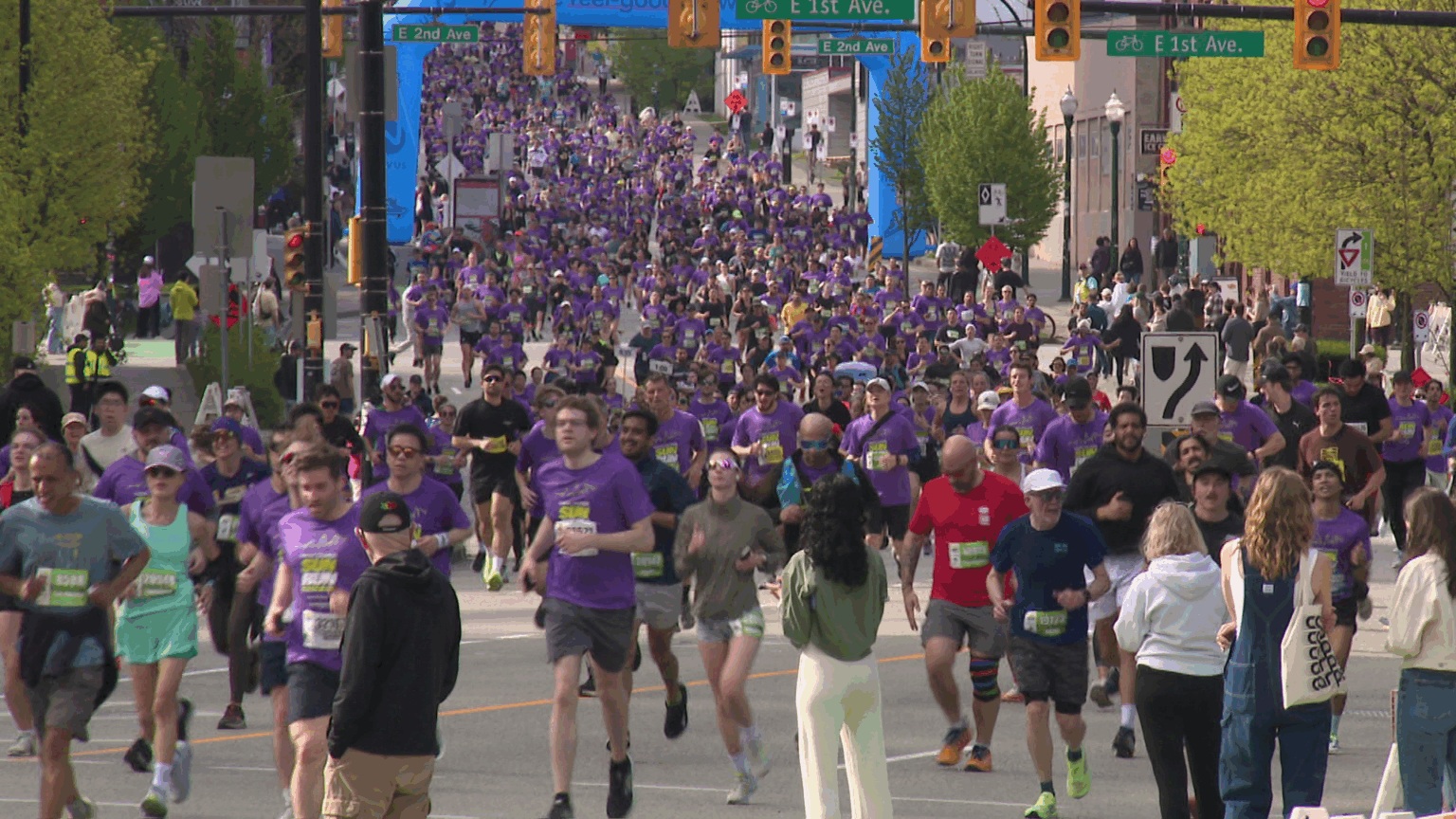 Thousands of runners participating in the Vancouver Sun Run 2026 through downtown Vancouver streets