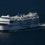 BC Ferries vessel at Sunshine Coast terminal with passengers waiting due to delays