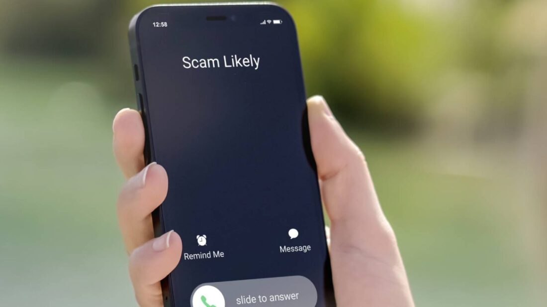 Person receiving scam call from fake police and bank fraudsters in Vancouver