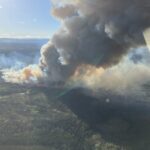 Wildfire smoke approaching commercial buildings in British Columbia