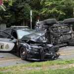 Vancouver police vehicle involved in a traffic collision as emergency responders investigate the crash scene.