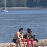 Vancouver skyline during summer heatwave highlighting concerns over city budget and extreme heat response planning
